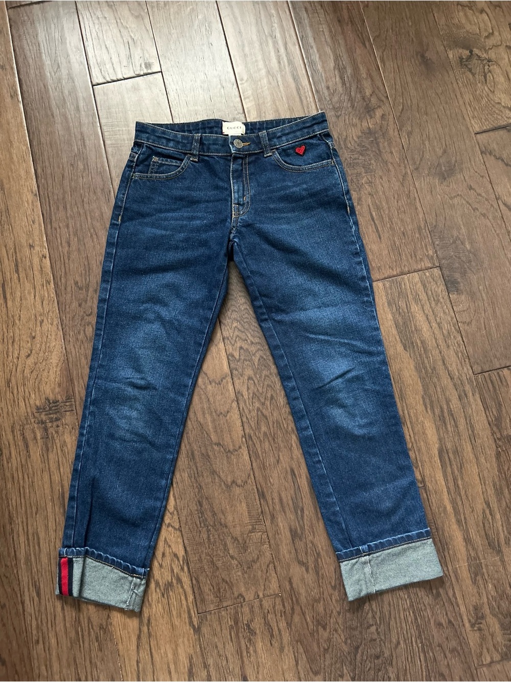 Gucci Dark Blue Denim Jeans with Tan Leather Logo Patch